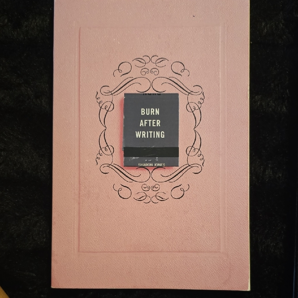 Pink Hardcover Book with Penguin Emblem